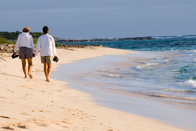 Couple walking on florida beach