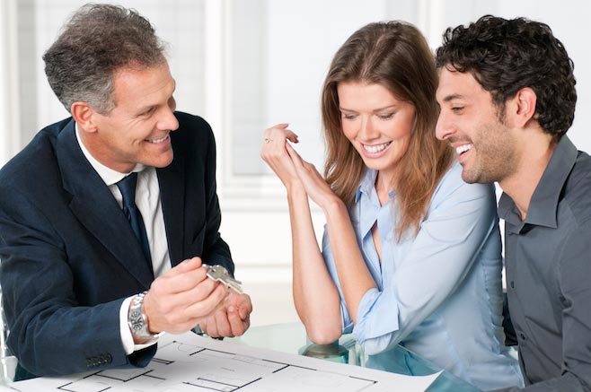 Real estate agent helping a couple buy a Florida home